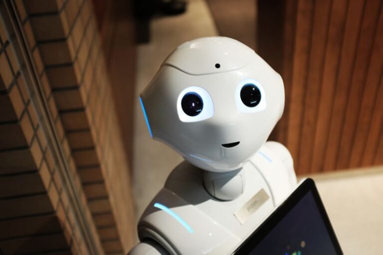 Automation Future - white robot near brown wall