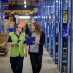 Cost Reduction Warehouse - a man and a woman in a warehouse