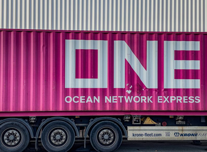 Networking Logistics - a pink truck with the word ocean network express painted on it