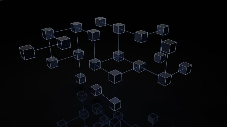 Blockchain Network - a black and white photo of cubes on a black background