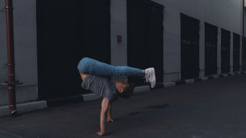 Flexible Chain - man doing handstand