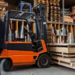 Warehouse Shelves - yellow and black fork lift