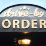 Order Fulfillment - order signage on grey wooden plank