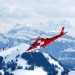 Efficient Transport - photo of flight of red and white rescue helicopter during snow daytime