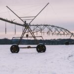 Automated Systems - a large metal structure sitting on top of a snow covered field