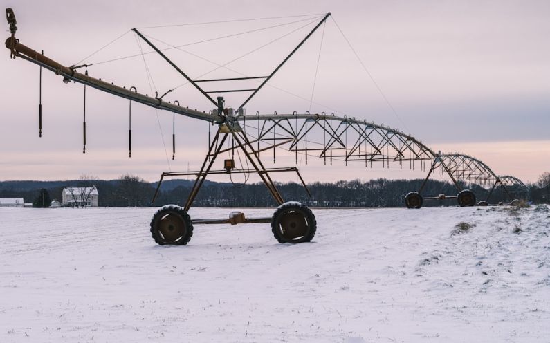 Automated Systems - a large metal structure sitting on top of a snow covered field