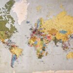 Global Visibility - blue, green, and yellow world map