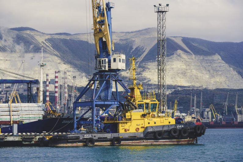 Global Warehouse - a yellow and black boat in a body of water